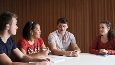 Student discussions in SLC.