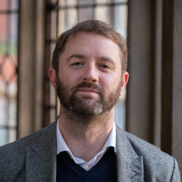 Profile picture of Portrait of a person with a beard smiling