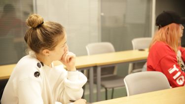 Two PhD students in a seminar