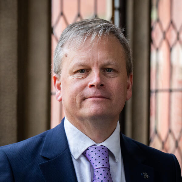 Profile picture of Portrait of a person in front of Firth Court windows